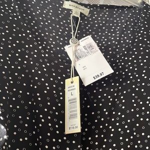 Never worn black and white polka dot Jumpsuit with ruffled sleeves